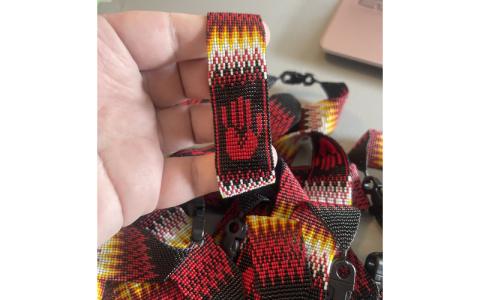 Submitted photo.  Missing and Murdered Indigenous Women bracelets beaded for Atlanta Braves players by Appalachian Beader David Green at his Bryson City home April 3. Richard Sneed and Gracie Bird were also commissioned to bead bracelets for the Braves team to wear when they face off against the Cincinnati Reds at Truist Park May 5.