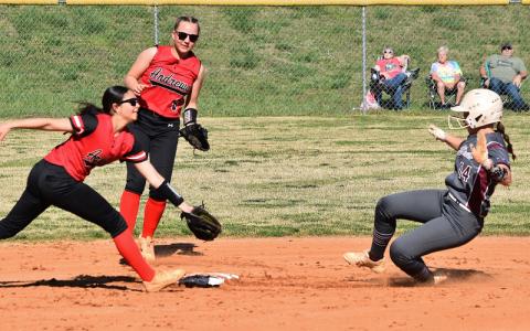 Photo/Joanna McMahan.  Molleigh Woodard steals second in a double-header home game Tuesday, April 1. Lady Devils beat Andrews 13-0 and 19-1 to sweep the series.