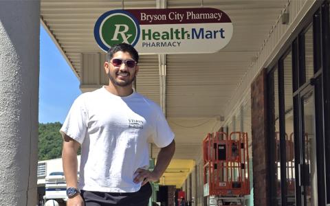 SMT photo/Sara Eisinger.  Pharmacist Ameer Adam prepares to open third Mark’s Pharmacy location at Valley Village Shopping Center Friday, May 23. 