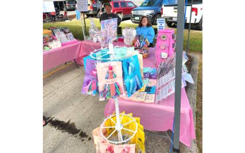 Submitted photo.  Swain Cancer Support volunteers set up during Bryson City Freedom Festival July 4, 2023. Volunteers sold T-shirts and other gift items, while accepting donations. 