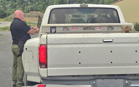 SMT photo/Sara Eisinger.  Swain County Sheriff’s Office Capt. Scott Barnes makes a traffic stop after noticing no plates on the afternoon of Friday, July 4. A citation was issued. 