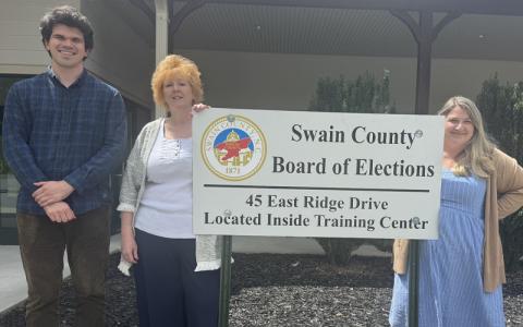 Submitted photo.  Swain County Board of Elections Director Adam Byrnes (left to right), Deputy Director of Elections Janna Hyatt and Elections Assistant Liana Crisp happily move into their new location.