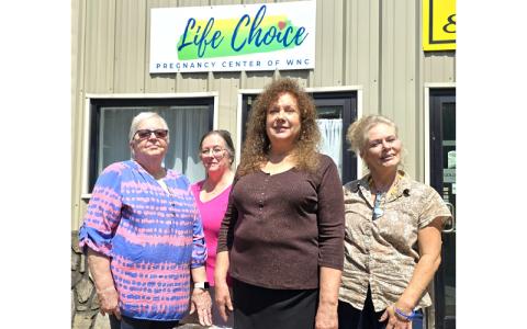 SMT photo/Sara Eisinger.  Louise Seagle (left to right), Adele Palmer, Melanie Gariuffi and Kaye Blue give time at Life Choice Pregnancy Center of Western North Carolina Aug. 19. The pregnancy center is a non-profit 501(c)(3), serving young pregnant women, mothers and fathers of unborn babies and young children in Bryson City and Robbinsville with an upcoming site at Christian Acts Church at the Crossroads in Whittier. 