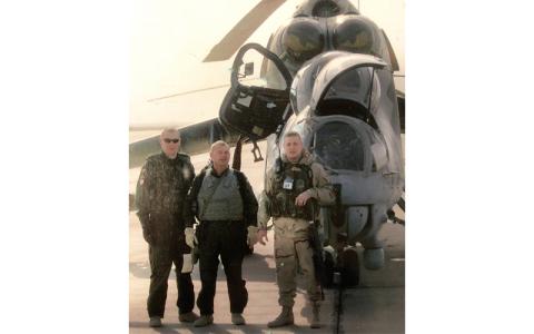 Submitted photo.  Swain County Sheriff's Office Chief Deputy Jason Ashe with a Polish flight crew at Baghdad International Airport circa 2004-2005. 