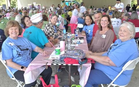 SMT photo/Sara Eisinger.  Swain County seniors dress in blue to represent their county’s senior center at the 7th running Senior Celebration in Bryson City Saturday, Sept. 13