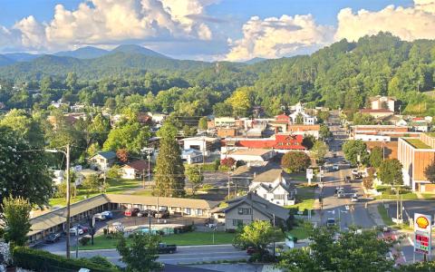 SMT photo/Sara Eisinger.  Light foot and vehicle traffic in the streets of Bryson City on the afternoon of Saturday, July 26.