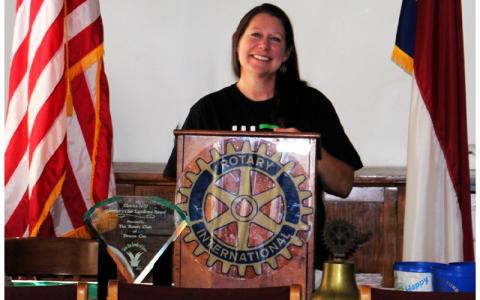 Submitted photo.  Amy Green, program manager BBBS of Swain County and Qualla Boundary, speaks at a Rotary meeting Sept. 11.  