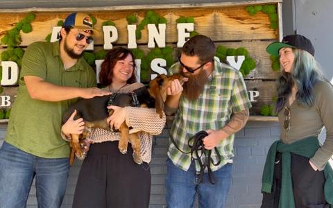 SMT photo/Sara Eisinger.  Hanging out outside Alpine Dispensary with Jonathan Gonzales (left to right), Trinity Segredo, Dude (dog), Eddie Askeldsen and Finley Hamilton in August 2025. 