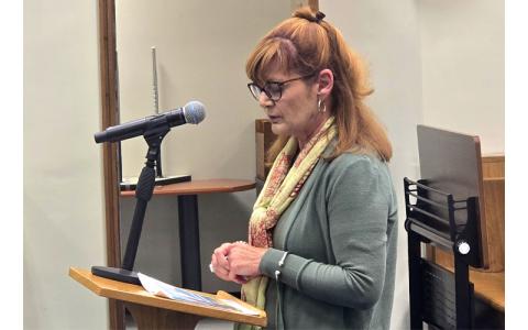Photo/Sara Eisinger.  Shelly Foreman, community relations regional director at Vaya Health, provides a brief update at a Swain County Commissioners meeting Nov. 18. 