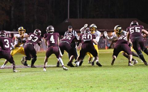 Photo/Joanna McMahan.   Oct. 31, 2025, Murphy at Swain.  The Swain offensive line (#53 Trent Jones, #65 Bruce Robertson, #60 Ayden Smiley, #68 Hunter Williamson, #55 Drew Scaggs) is working against Murphy on a give from #4 Ayden Kirkland to #3 Kaden Sawyer. 