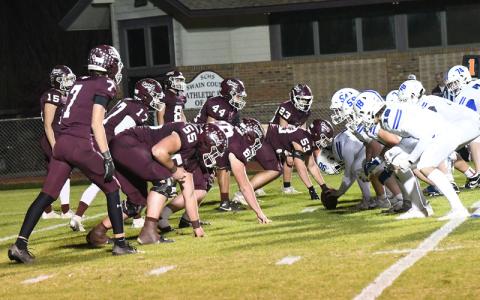 Photo/Joanna McMahan.  Above: The Swain defense defends their turf against the Community School of Davidson at the Nov. 14 playoff game. 