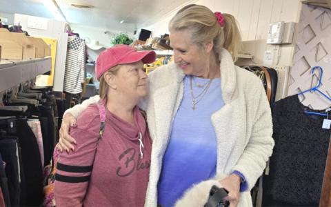 SMT photo/Sara Eisinger.  Judy Allman and Karen Matthews embrace over stage 3 cancer diagnosis Dec. 3. Matthews owns a nonprofit known as Cancer Awareness Foundation. 