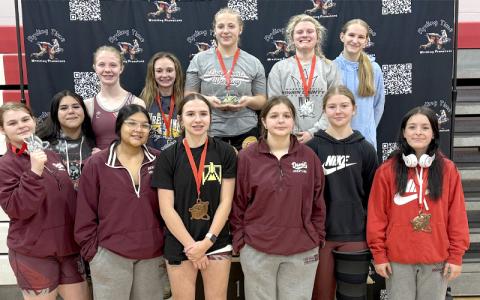 Photo submitted.  Varsity competitors Izabella Ponton (left to right), Alexis Tranter, Melyssa Wildcat, Madison Mashburn, Asiah Ball, Mattie Brown, Chloe Kent (Back) Claire Ball, Elaynah Cogdill, Makayla Hunt, Lindsey Faulkenberry and Elliana Norton at Hendersonville Jan. 3.