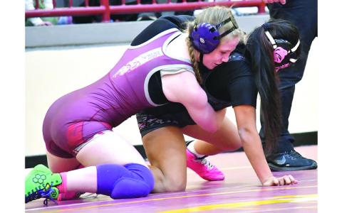 Photo/Joanna McMahan. Claire Ball wrestles from the “top” position versus a Robbinsville Lady Black Knight in the girls 120-lb weight class. Ball was named co–Smoky Mountain Conference Wrestler of the Year, sharing the honor with Cherokee’s Pippa Welch. 