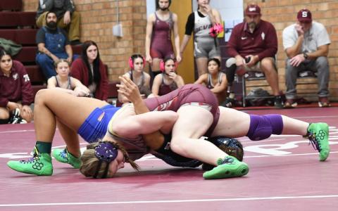 Submitted photo.  Claire Ball pins opponent at East Henderson High School Jan. 13.