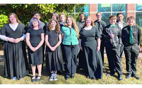 Submitted photo.  From left: Katelyn McNorrill, trombone, Frank Carrasco, clarinet; Joy Guest, clarinet; Ernest Locust, bass clarinet; Mya Hyde, flute; Joseph Demonet, trombone; Sarah Smith, alto sax; Deshawn Collier, percussion; Isabel Barker, clarinet; Adam Scheid, baritone; Lucas Dickens, trumpet; Abraham Palmer, bari sax; and Tommy Dickens, clarinet, play in regional All-District Band Clinic at WCU. 