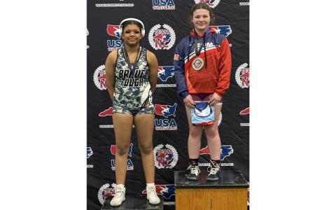 Photo/Ian Roper. Dixie Ball wins girls state championship in the 147-pound weight class during the NCUSA Middle School State Championship in Bermuda Run Feb. 7. Fellow sixth-grader Sawyer Norton finished state runner-up in the 92-pound division.