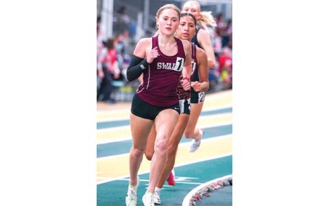 Submitted photo. Annie Lewis dominates the NCHSAA 1A/2A Indoor Track and Field Championships at JDL Fast Track in Winston-Salem, capturing state titles in the 1600-meter and 1000-meter runs in Feb. 2026.