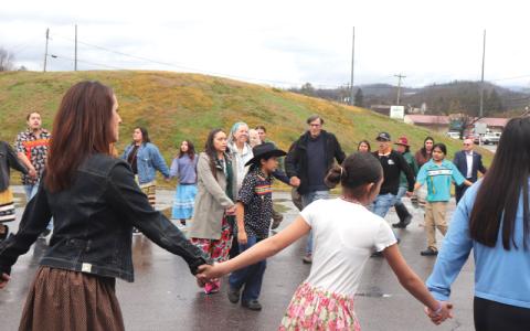 NC Local/ Lilly Knoepp.   The Aniyvwiyahi Dancers Youth Group performed the Friendship Dance at the Noquisiyi Mound Deed Transfer with community members.
