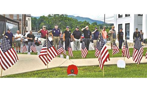 Veterans line up to honor the men and women who gave their lives in service to the nation at the veteran’s monument outside Swain County Visitor Center and Heritage Museum on Memorial Day, May 25.