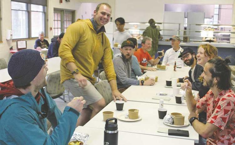 Press photo/Shelby Powell - Teams participating in the Smoky Mountain Relay stopped for a free breakfast hosted by Cowee School volunteers. Each member of this team was from the Southeast, with members from Bryson City, Chattanooga, Nashville, Sylva and Asheville.