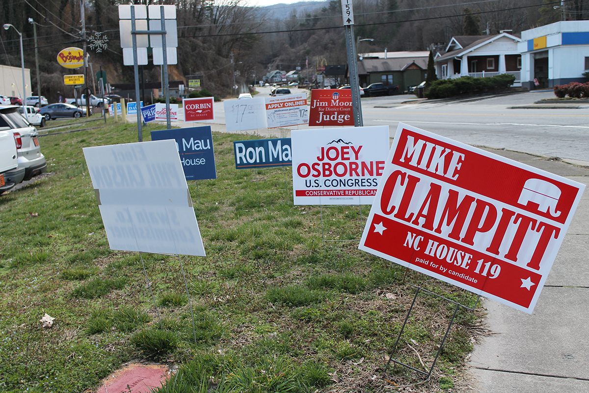 Political signs crowd the corner on Veterans Boulevard and Main Street in downtown Bryson City. 