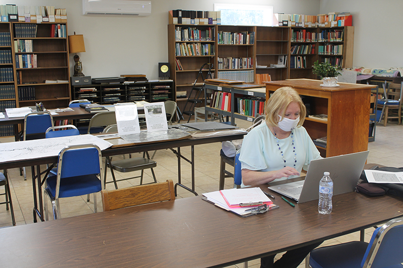 Elise Bryson, president of the Swain County Genealogical and Historical Society, is working on an article for the next edition of the SCGHS newsletter, The Bone Rattler. On Monday, she provided Smoky Mountain Times a tour of the office and library located in a new building. 