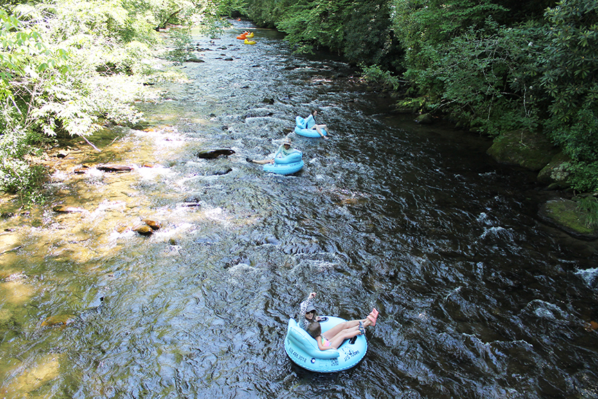 Brightly colored tubes are once again a common sight at Deep Creek in the Great Smoky Mountains National Park as people head to the cool water for some fun and relief from the summer heat. 