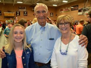 Dennis White, center, is pictured with his grandaughter Kendall Bowers and wife Debi White. 