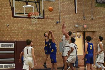 Swain Maroon Devil Nick Millsaps shoots in the home win over the Highlanders.