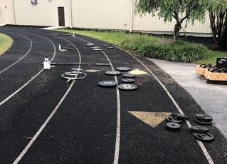 Weights on the track are used for football training