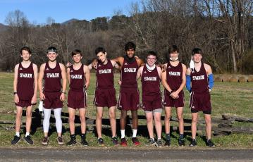 Photo by Joanna McMahan The Swain Maroon Devils cross country team is pictured at the beginning of the season. The team has high hopes for this short season. 