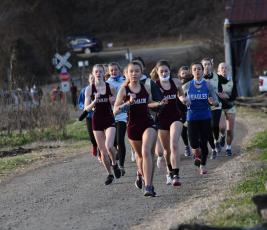 Lady Devils lead a pack of runners at the recent meet at Kituwah