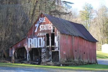 The “Rock City” barn on US 19 in Bryson City- across the road from Bear Hunter’s Campground- is a relic of the past, a symbol of a time when tourists traveled mostly on two-lane highways. 