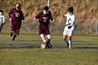 Maroon Devil Matthew Grey takes control of the ball in a home scrimmage last week