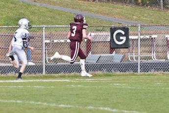 Photo by Joanna McMahan Maroon Devil Josh Collins scored on a 49-yard run in the home game against Robbinsville. 