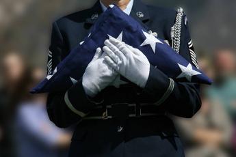 Folded flag at veteran funeral