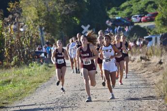 Swain hosted the Smoky Mountain Conference Championship meet on Wednesday at Kituwah. The girls, above, were named Conference Champs
