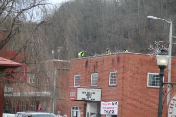 Workers with WNC Roofing began work on the roof at the Smoky Mountain Community Theatre on Monday. The work is anticipated to be completed in two weeks. 