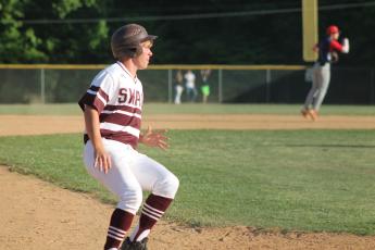 Senior Gavin Lanning lands on third base looking toward home at the championship tournament vs. Union Academy.