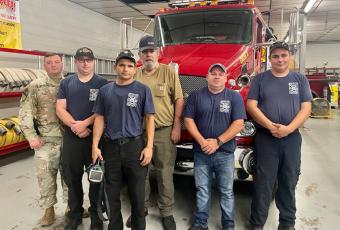 (From left) Newly elected Lt. Kevin Bryson, Full-time firefighter Phil Carson, Lt. Darius Blanton, Cpt. Jeff Gasaway, Cpt. Jeramy Shuler, and Cpt. Tyler Taylor of BC Fire Department stand in front of recently delivered new fire truck.
