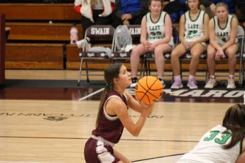 Senior Amaya Hicks takes a foul shot at the game against North Stokes during Swain’s Christmas tournament last week.
