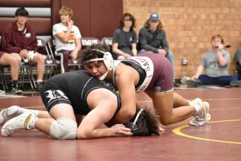 Maroon Devil Saunooke earned his team there points in the dual against Robbinsville.
