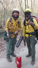 Steve Scott, assistant fire management officer, and student Montel Filmore are pictured at a recent prescribed burn.