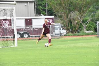 Anna Gray goes in for a kick at the Lady Devils soccer game played on Thursday, May 18. The game was a hard fought one and the Lady Devils only lost to opponents Cornerstone Charter after numerous overtime plays.