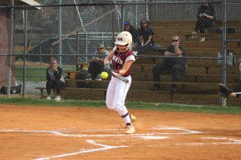 Sophomore Molleigh Woodard hits the ball at the home game against Hayesville on Monday, April 1.
