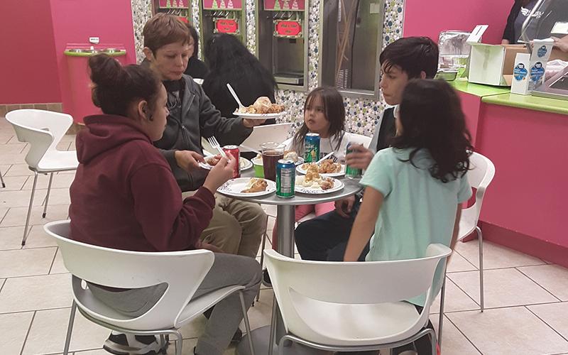 A family enjoys a meal