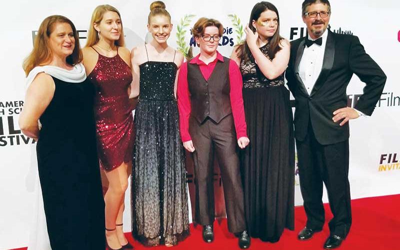 Photos submitted/SMT - Swain High Cinema Club members and alumni attend the All American High School Film Festival Red Carpet Event for the Teen Indy Awards. Pictured from left is Kim Holt, Tayla Holt, Amelia Rogers, Catherine Sawyer, Hannah Bradford and Joe Holt.