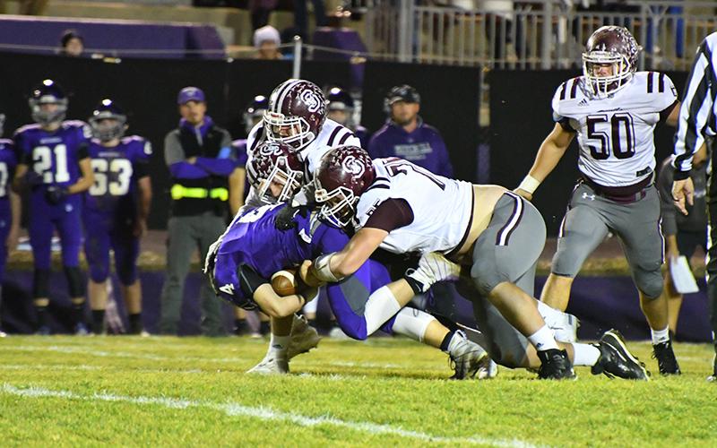 The 2019 Maroon Devils Varsity Football team had a good run this season, wrapping things up with a loss to 2nd seed Mitchell in the third round of playoffs. Above, Maroon Devils defense takes down a Mountaineer in the game that ended in a score of 38-6.