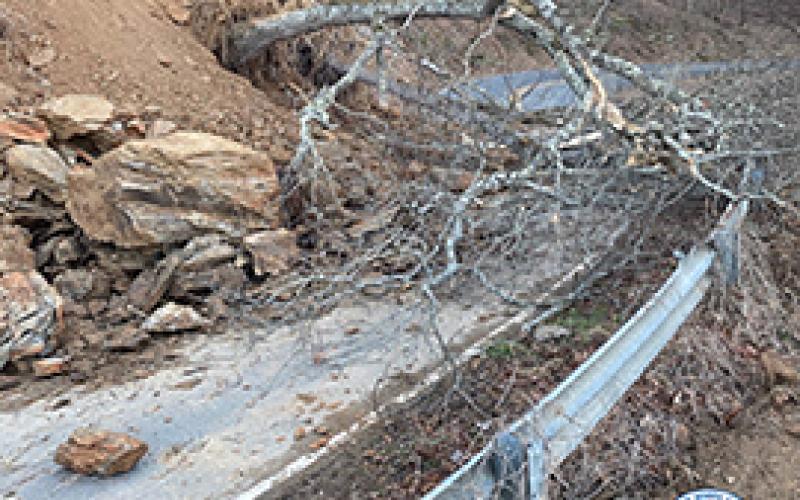 A landslide on NC28 and a tree blocks the road